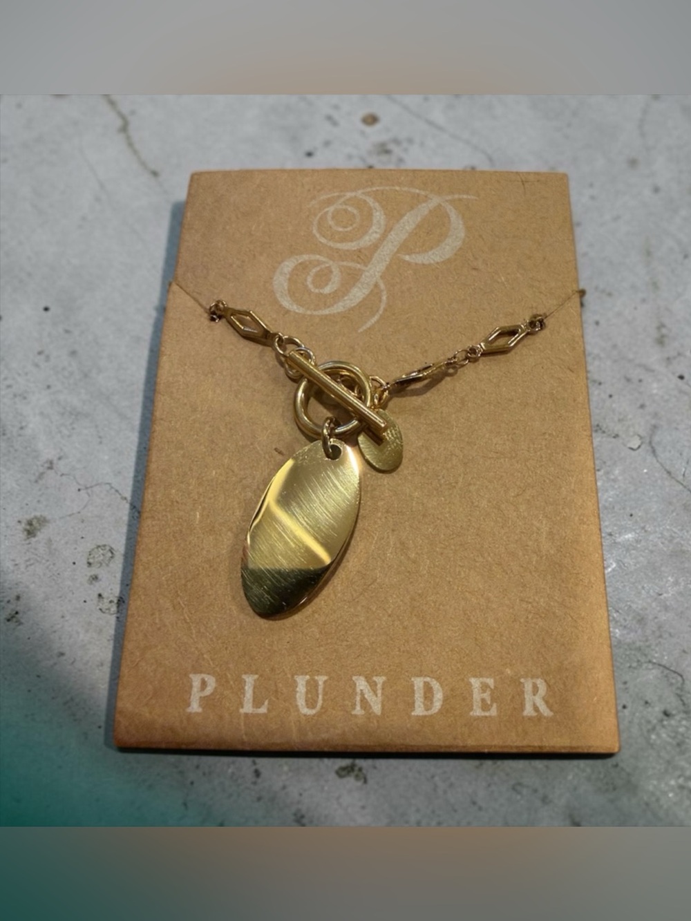 Plunder Gold Toggle Necklace with Brushed Oval and Mini Disc Charms